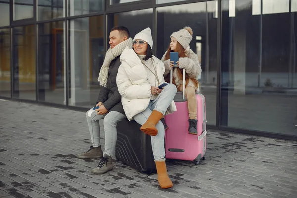 Family Three Going Vacation Man Woman Sitting Luggage Holding Passports — Zdjęcie stockowe