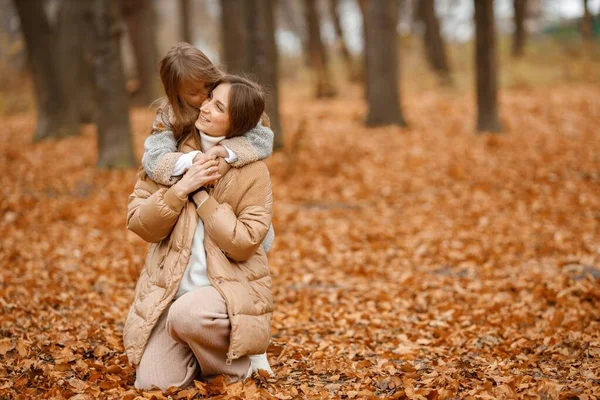 Young Woman Little Girl Autumn Forest Woman Her Daughter Hugging — стоковое фото