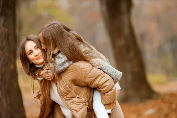 Young Woman Little Girl Autumn Forest Woman Carry Her Daughter — Stockfoto