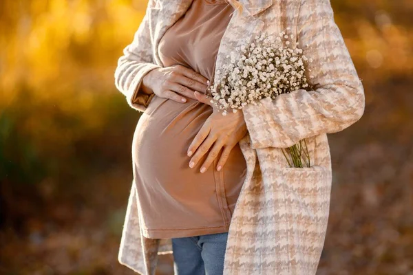 Close Expecting Pregnant Woman Wearing Brown Shirt Beige Jacket Holding — 图库照片