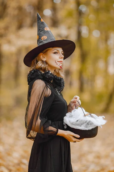 Blonde Young Girl Witch Forest Halloween Girl Wearing Black Dress — Stock fotografie