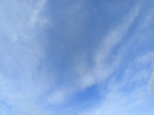 The reflection of light in the evening on the blue sky