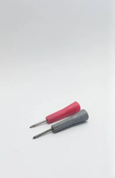 Isolated objects: small screwdriver on a white background