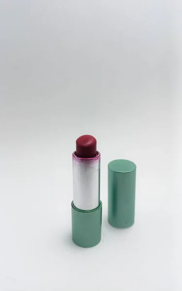 Isolated objects: Red lipstick on a white background