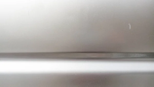 metallic silver car paint during the day