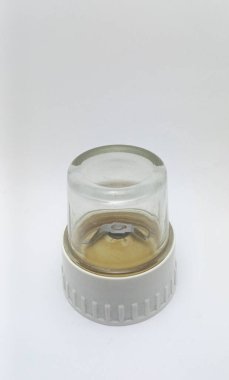 Isolated objects: glass spice blender jar for spices, on white background.