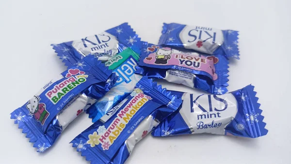 Jakarta, Indonesia - December 11, 2022: Isolated objects: mouth mints candy biscuits produced by PT Mayora Indah, on white background, Jakarta, Indonesia