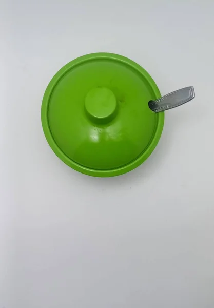 Isolated object: Sambal Bowl with Melamine material in green color, on a white background