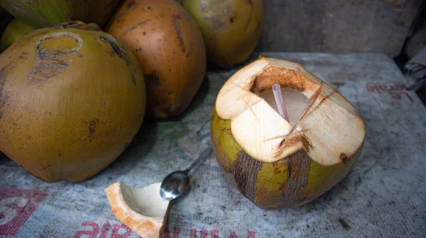 coconut trading area on the side of the road