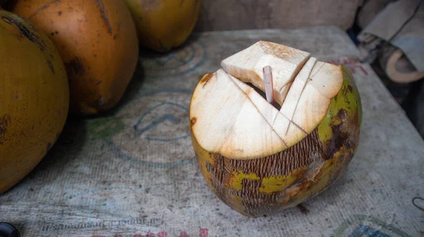 coconut trading area on the side of the road