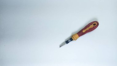 Insulated object: Pocket precision screwdriver set. 31 sets of easily stainless convertible screwdrivers on an insulated white background