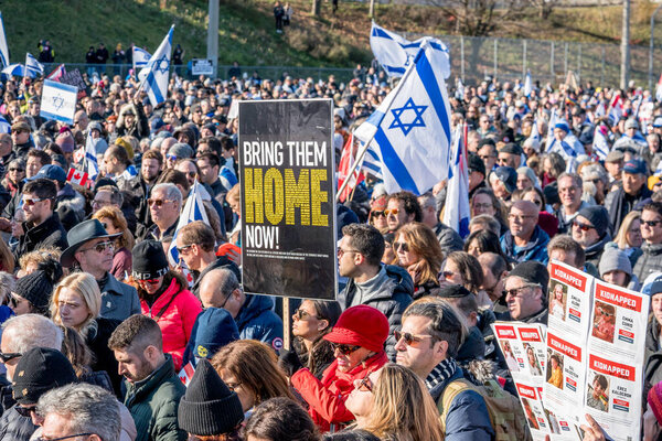 The UJA (United Jewish Appeal) Solidarity Rally For The Hostages in Toronto on November 12, 2023 transformed the park into a focal point of collective empathy, as participants, against the backdrop of solidarity banners