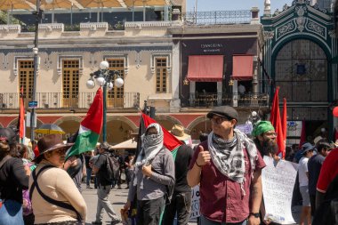 Puebla, Meksika -16 Mart 2024: Meksika 'nın Puebla kentinde Filistin yanlısı bir miting düzenlendi ve bölgede devam eden çatışmalar sırasında Filistinlilerle dayanışma içinde olan katılımcılar katıldı..