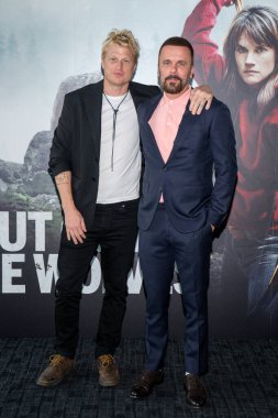 Toronto, Canada - 31 August, 2024: Adam MacDonald, Joris Jarsky attend the Out Come The Wolves screening at Scotiabank Theatre clipart