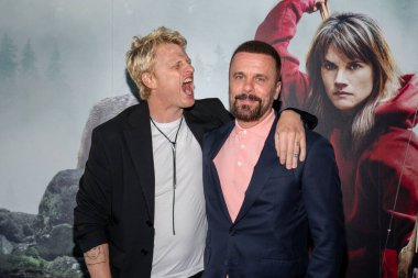 Toronto, Canada - 31 August, 2024: Adam MacDonald, Joris Jarsky attend the Out Come The Wolves screening at Scotiabank Theatre clipart