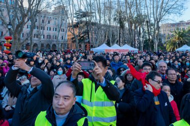 Rome, Italy - February 5, 2023: Citizens of the Chinese community celebrate their New Year's Eve party inside the gardens of Piazza Vittorio Emanuele. The event is open to the public with performances of dance, martial arts and traditional Chinese mu