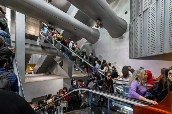 stock image Naples, Italy - April 21, 2023: In the Garibaldi station of the Metro line 1 people enter and exit using the many escalators.