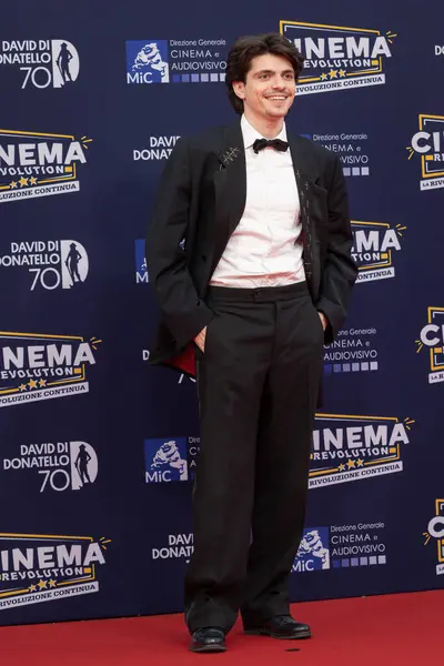 Roma, İtalya - 7 Mayıs 2025: Emanuele Palumbo, 70. David Di Donatello Cinecitta Stüdyoları sırasında 7 Mayıs 2025 'te İtalya' nın başkenti Roma 'da kırmızı halıya katıldı..