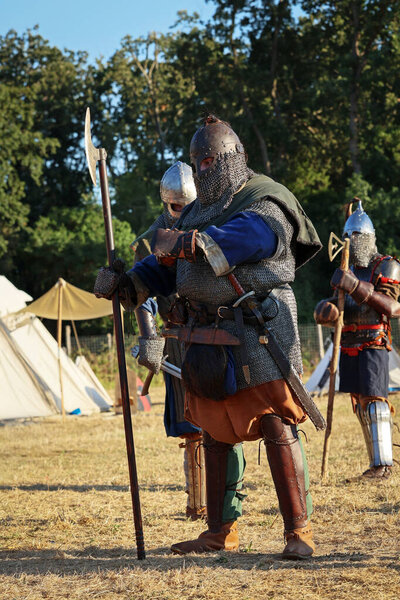 Ladispoli (RM), Italy - June 28, 2025: The Drakkar Viking Fest is a Viking historical reenactment. Viking warriors wearing armor face each other in a simulated combat, in the style of Norse culture. Historical reenactment.