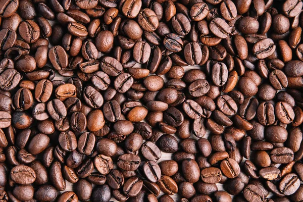 茶色のローストコーヒー豆の背景 画像の閉鎖 ストック画像