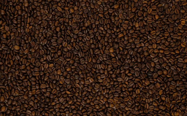 茶色のローストコーヒー豆の背景 画像の閉鎖 ストック写真