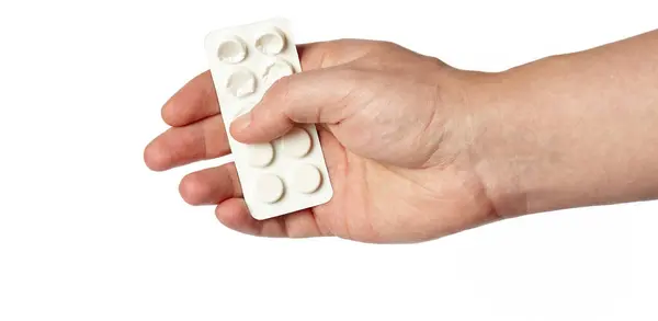 Tangan Pria Memegang Pil Putih Dalam Bentuk Tablet Biasa Terisolasi — Stok Foto