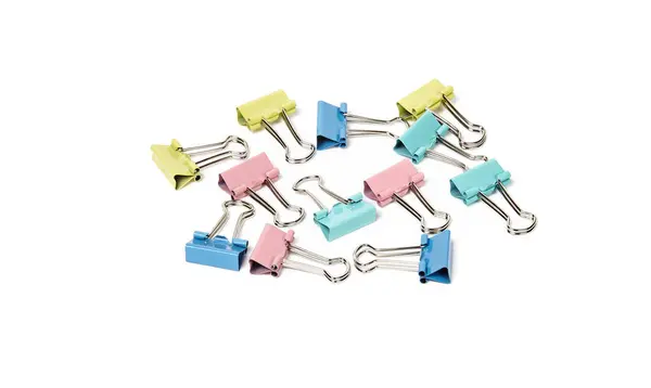 stock image Multicolor binder clips isolated white background. Heap of color stationery clips