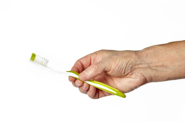 Mão Masculina Segurando Uma Escova Dentes Sem Pasta Dentes Isolada — Fotografia de Stock