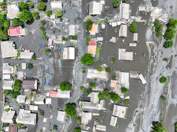 stock image Consequences of the explosion of the Kakhovka Hydroelectric Power Plant. Flooded villages and houses, top aerial view. Exclusive drone footage. Kherson region Ukraine. Russo-Ukrainian War