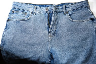 Old vintage Blue hipster jeans. Denim Cloth texture background. Natural fabrics textile.