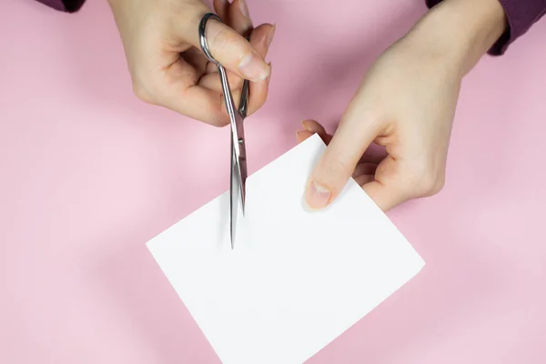 Woman Cutting White Paper Scissors Close — ストック写真