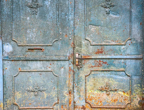 stock image Blue metal doors. Old vintage style. Rusty texture.