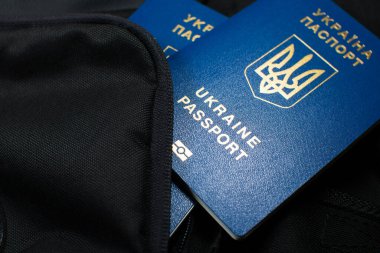 Ukrainian biometric passport id to travel the Europe without visas on the backpack. Inscription in Ukrainian 