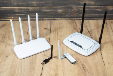 Different types of Wi-Fi routers, modern and old technology. Wireless ethernet connection signal. USB Wifi Receiver Wireless Network Card. High Speed Antenna Wifi Adapters. clipart