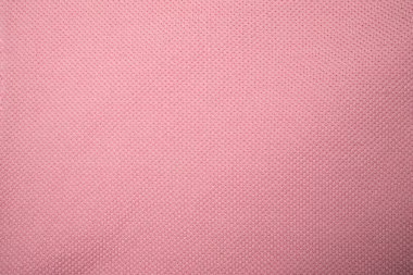 Pembe elbiseler arka planda. Kapat..