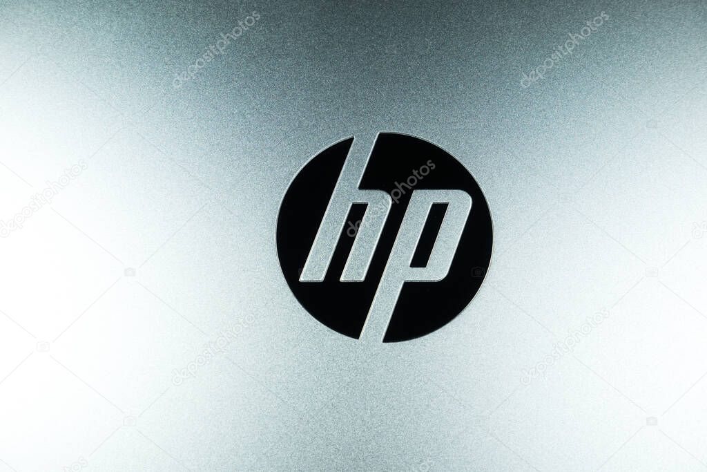 KYIV, UKRAINE - June 20, 2022 : Silver aluminum brand logo of HP Hewlett Packard. Close up.