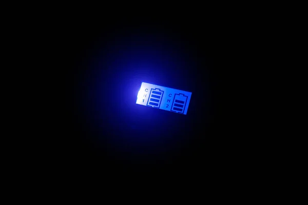 Glowing battery charge indicator. Fast charging technology.