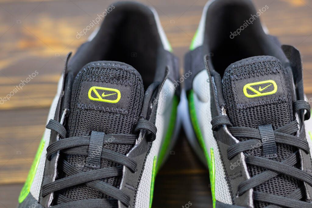 KYIV, UKRAINE - June 25, 2025 : Nike Streetgato IC. Men's soccer football shoes. Trainers, close up Nike logo brand name.