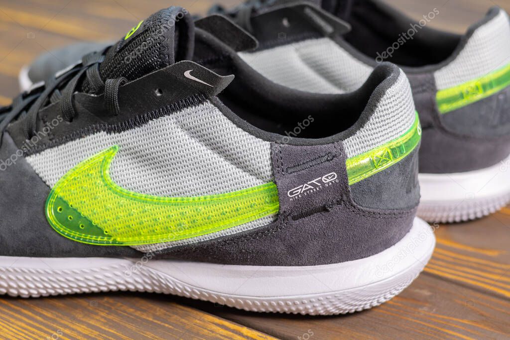 KYIV, UKRAINE - June 25, 2025 : Nike Streetgato IC. Men's soccer football shoes. Trainers, close up Nike logo brand name.