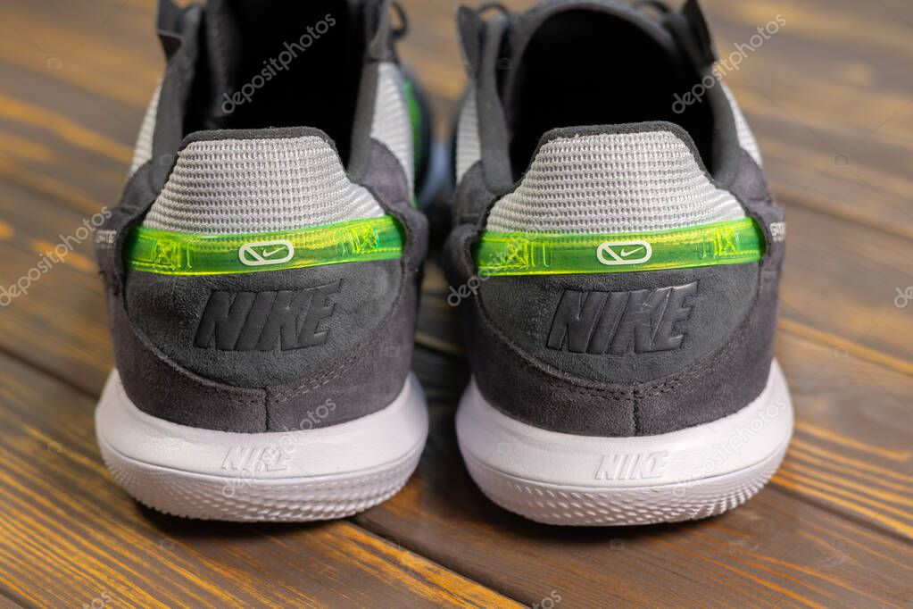 KYIV, UKRAINE - June 25, 2025 : Nike Streetgato IC. Men's soccer football shoes. Trainers, close up Nike logo brand name.