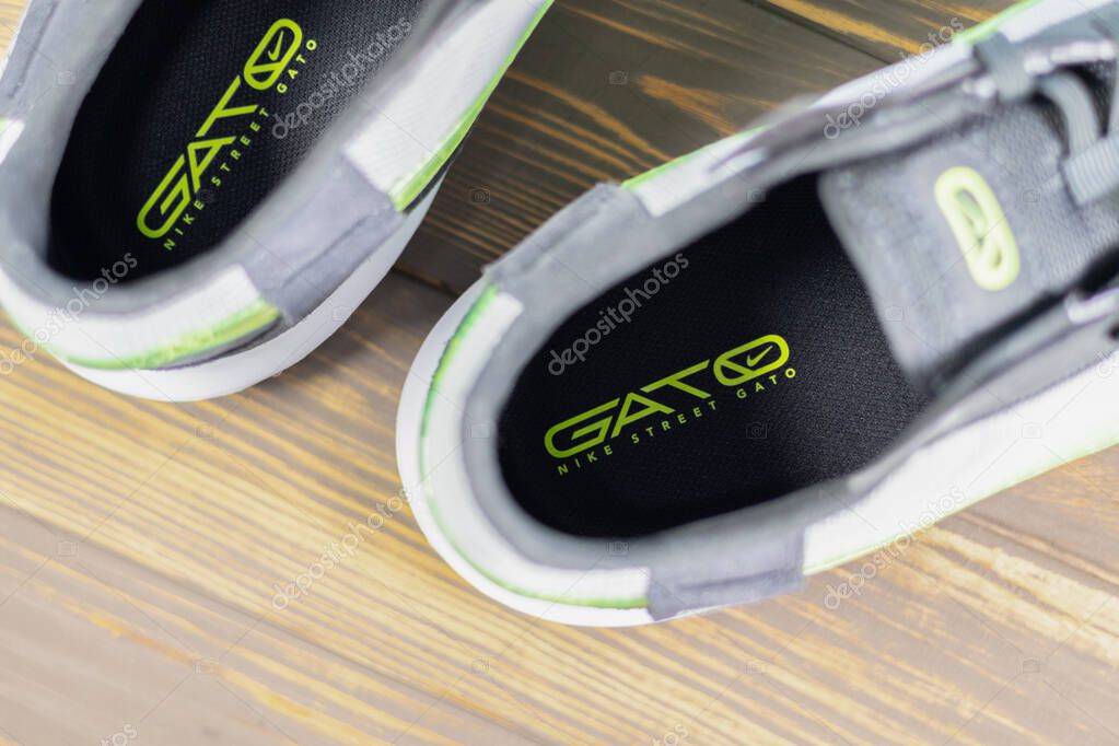 KYIV, UKRAINE - June 25, 2025 : Nike Streetgato IC. Men's soccer football shoes. Trainers, close up Nike logo brand name.