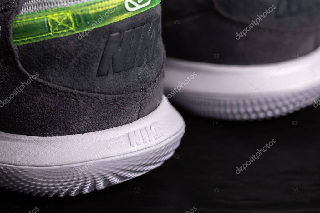 KYIV, UKRAINE - June 25, 2025 : Nike Streetgato IC. Men's soccer football shoes. Trainers, close up Nike logo brand name.