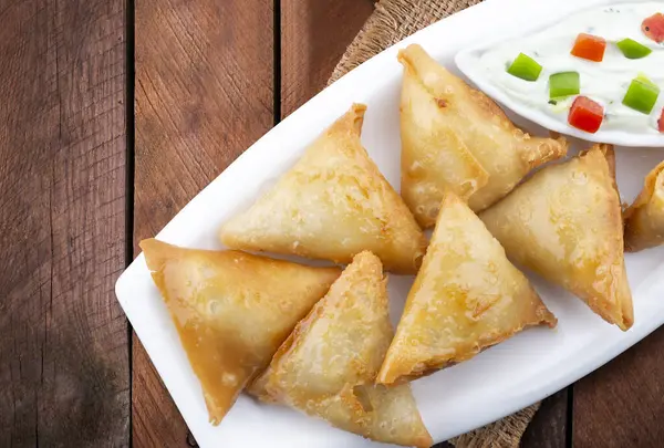 stock image Isolated Potato Samosa Snacks on White Background. Indian Ramadan Food, Pakistani Iftar Meal.