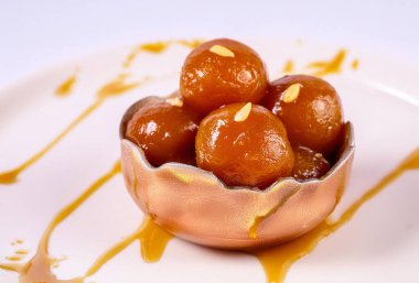 Firefly gulab jaman with nuts syrup isolated background. Ai Generated clipart