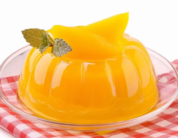 Stock image Mango Jelly in a glass bowl on a checkered isolated. ai generated