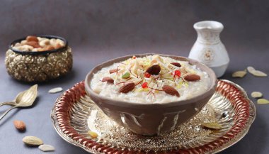 Semiya payasam or shewai or sewai Khir or seviyan Kheer is a Indian sweet made with vermicelli, milk, ghee, sugar or jaggery, raisins and nuts. ai generated clipart