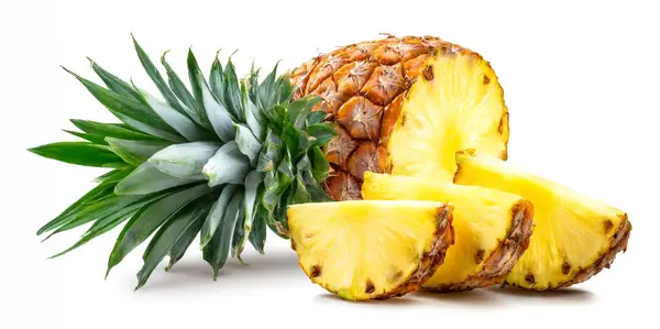 stock image Ripe pineapple and pineapple slices isolated on white background. 