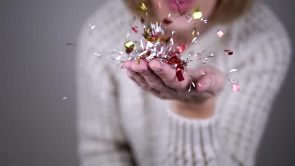 Happy Woman Blowing Shiny Colorful Confetti Hands Blurred Background Inglês — Vídeo de Stock