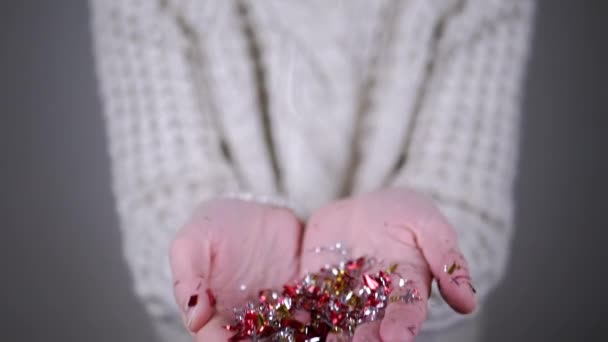 Female Hands Throws Shiny Sparkles Tinsel Confetti Blurred Background Gros — Video