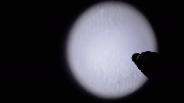 Unrecognizable Person Shines Flashlight Wall Dark Room Close Silhouette Hand — 비디오
